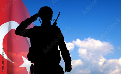 Silhouette of soldier with Turkey flag on background of sky. Background for Turkish Armed Forces Day, Victory Day. EPS10 vector