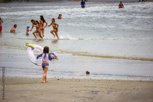 children running on the beach