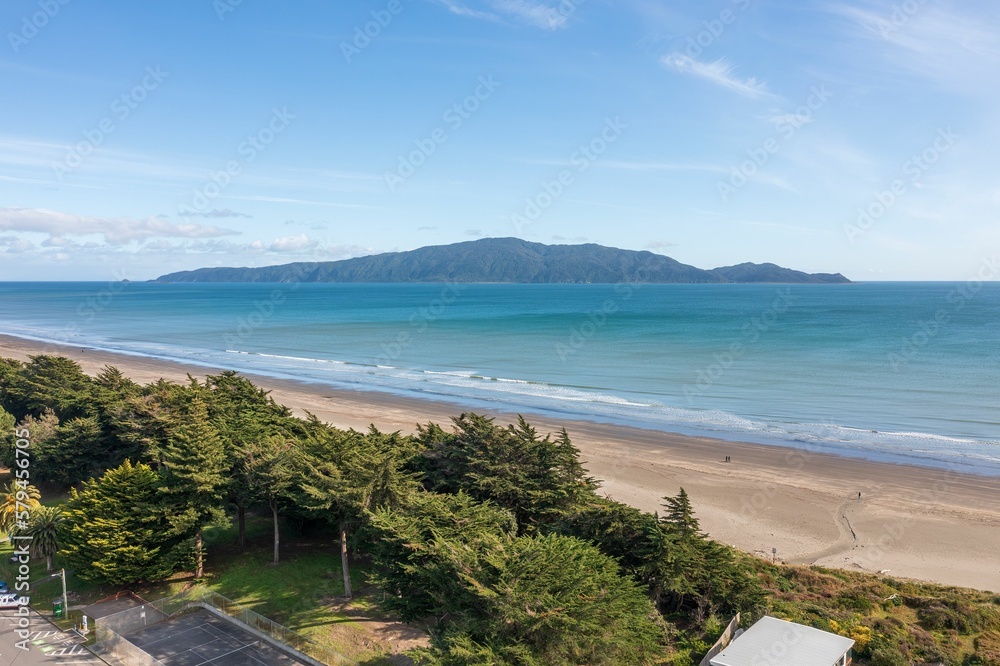Beautiful view of Waikanae Beach with Kapiti Island in the background in New Zealand