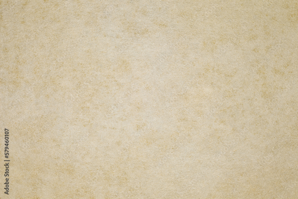 Fototapeta premium Paper old yellowish spots, background wallpaper, uniform texture pattern