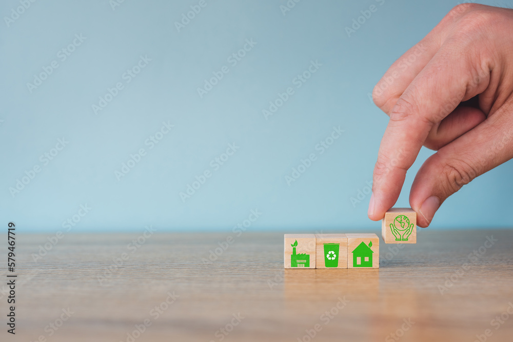 Carbon neutral concept. Net zero greenhouse gas emissions target. Climate neutral long term strategy. Stacking wooden cubes with green net zero and save world icon on grey background.
Carbon neutral concept. Net zero greenhouse gas emissions target. Climate neutral long term strategy. Stacking wooden cubes with green net zero and save world icon on grey background.