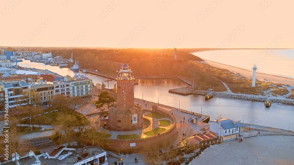 Harbour and lighthouse in Kolobrzeg. - obrazy, fototapety, plakaty 
