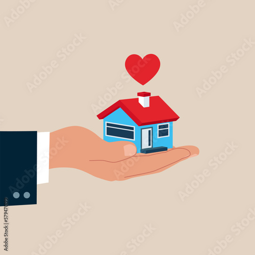 Hand holding tiny house with red comic hearts. Selling or buying property. Modern vector illustration in flat style