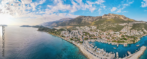 Fototapeta Naklejka Na Ścianę i Meble -  Kas beautiful small town on mediterranean coast in turkey, aerial wide panorama