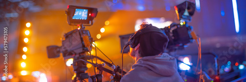 Slika na platnu cameraman filming a concert for tv