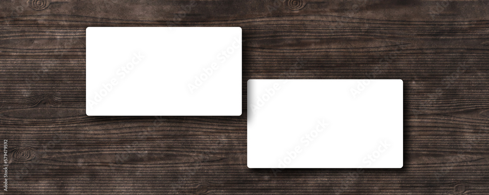 White blank business card mockup on old wood texture background White blank business card mockup on old wood texture background