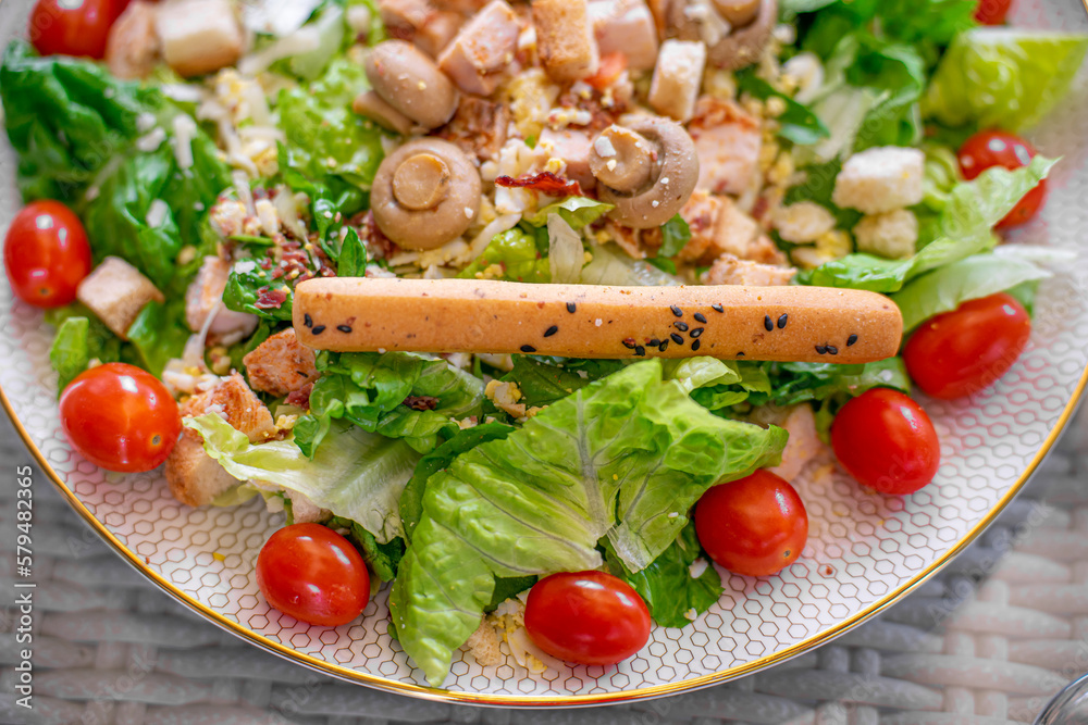 Salad With mini tomatoes, bread stick ,vegetables ,mushroom and chicken Salad With mini tomatoes, bread stick ,vegetables ,mushroom and chicken