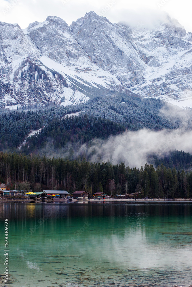 Snowy Alps Mountains and Clear Lake