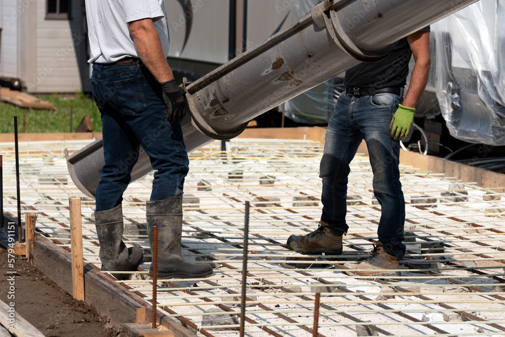 Pouring concrete for a stamped floor Pouring concrete for a stamped floor