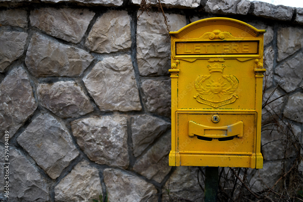 Old yellow mailbox in Montenegro Old yellow mailbox in Montenegro