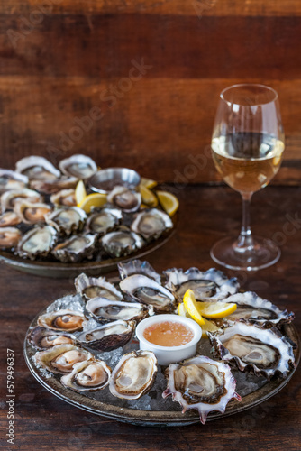 Raw Oysters with Mignonette sauce and white wine