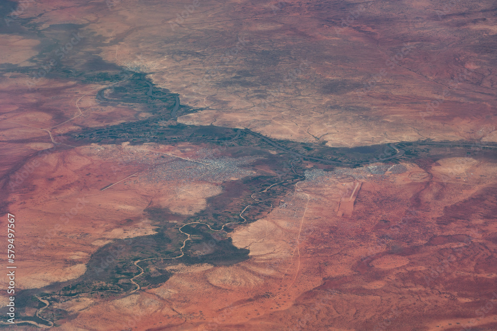 African aerial landscape view of Border area between Dolo in Ethiopia and Doolow in Somalia, located in the place where the rivers Ganale and Dawa join to form the River Jubba - obrazy, fototapety, plakaty 