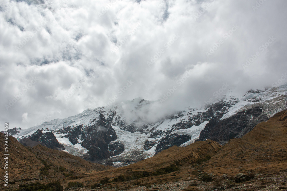 View of the mountain and the glacier Salcantay, with incredible clouds, from the city of Soray, in Peru. 
