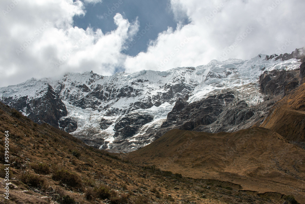 View of the mountain and the glacier Salcantay, with incredible clouds, from the city of Soray, in Peru. 