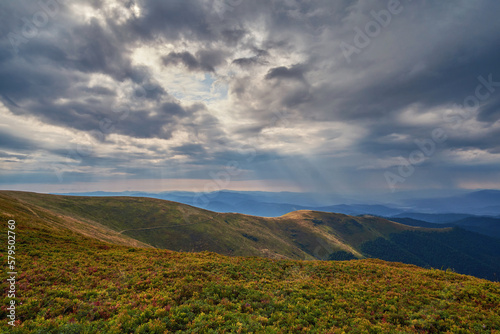 Mountain landscape with gentle slopes on a cloudy day. The beauty of the Ukrainian Carpathians