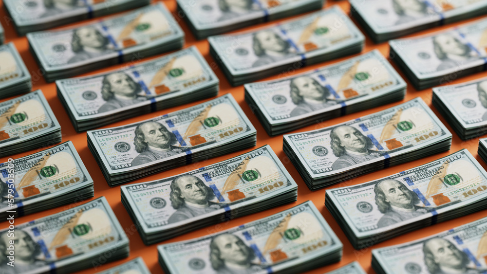 Rows of stacks of United States US one hundred dollar bill currency repeating pattern Rows of stacks of United States US one hundred dollar bill currency repeating pattern