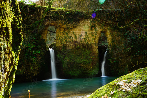 Waterfalls over the ancient grindstone of Biedano gorges, Barberano Romano, Blera, Viterbo, Lazio, Italy photo