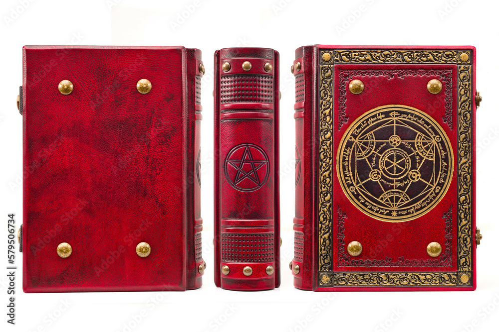 Fototapeta premium old book cover in red leather with gilded the frame and central detail 