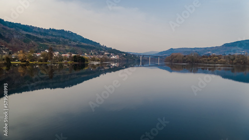Aerial drone photography over the Mino river in the town of Barbantes in the province of Orense, in Galicia, Spain.