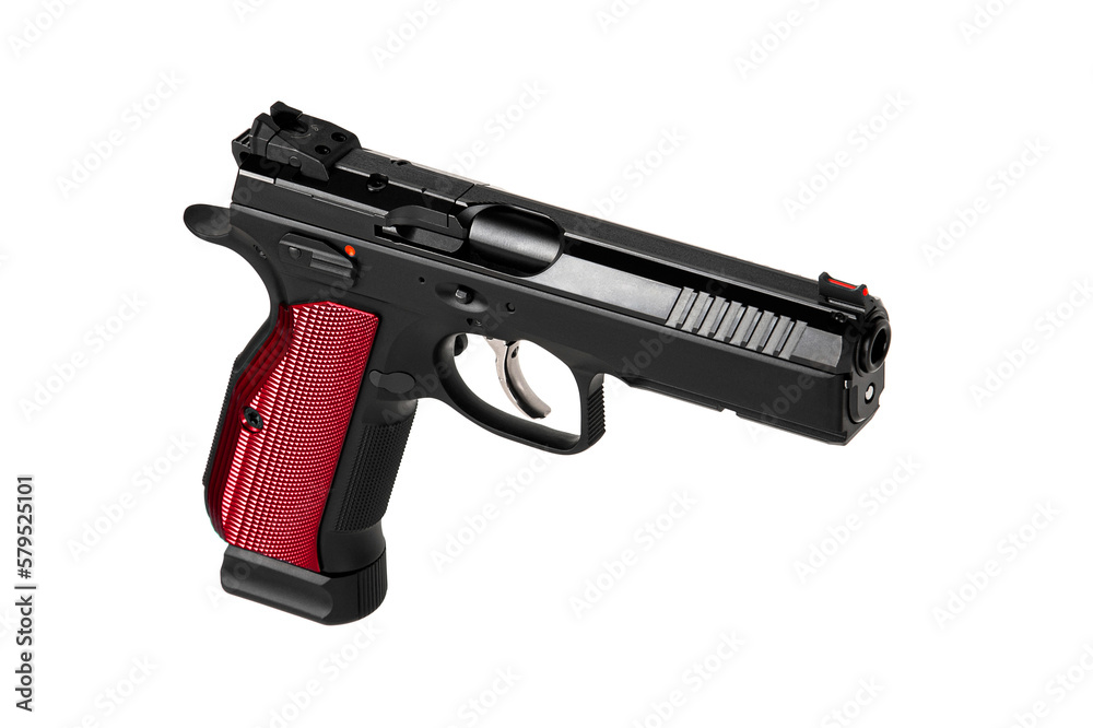 A modern black semi-automatic pistol with a red grip. A short-barreled weapon for self-defense and sport.  Isolate on a white back.