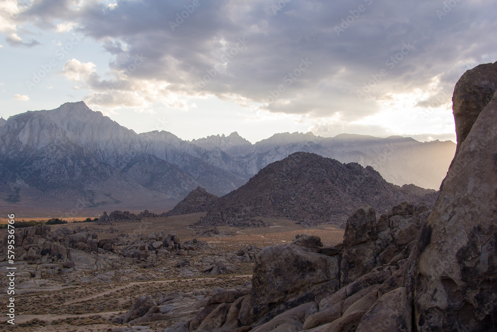 storm clouds roll through the eastern Sierra Nevada mountains and the Alabama hills, near lone pine, California