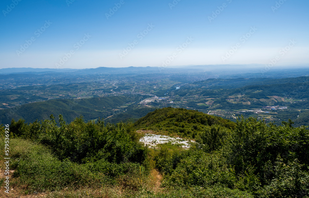 Landscapes of Western Serbia, view from the top of the Ovcar Mountain with bench and resting place