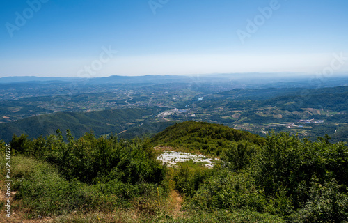 Landscapes of Western Serbia, view from the top of the Ovcar Mountain with bench and resting place
