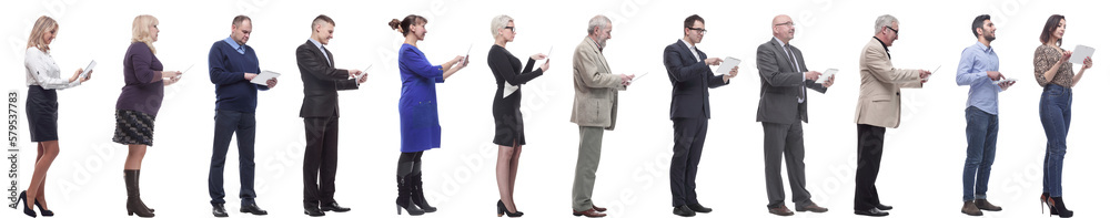 group of people holding tablet and looking ahead group of people holding tablet and looking ahead