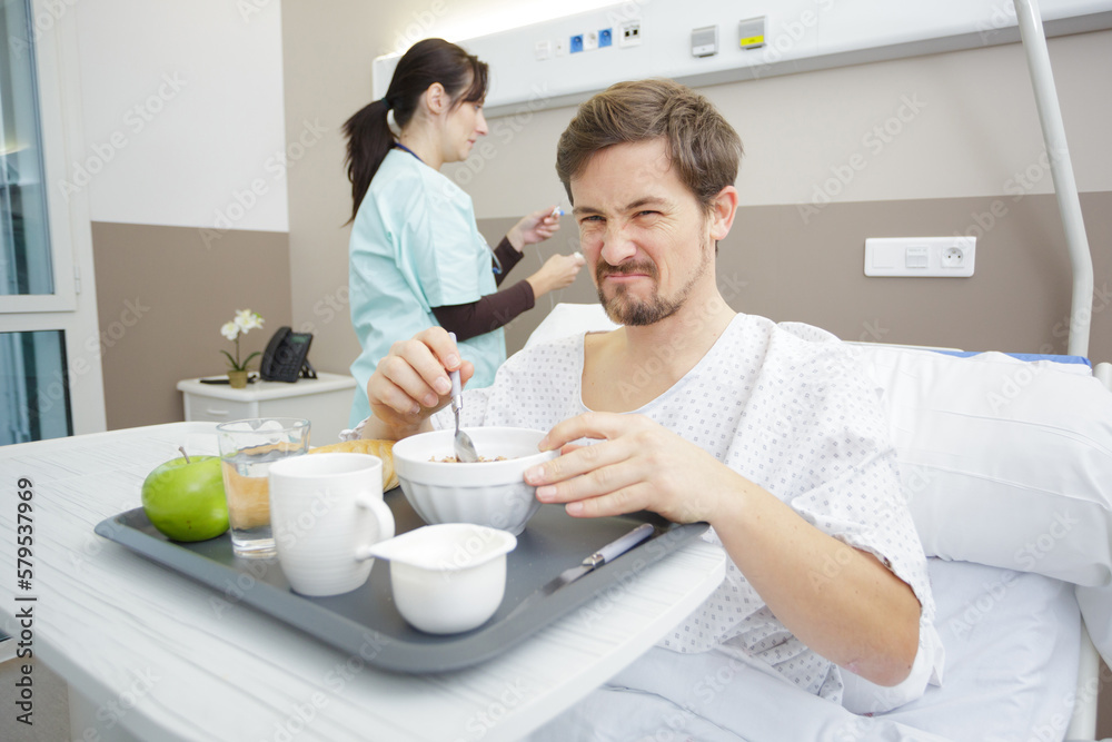 disgusted patient having breakfast in hospital disgusted patient having breakfast in hospital