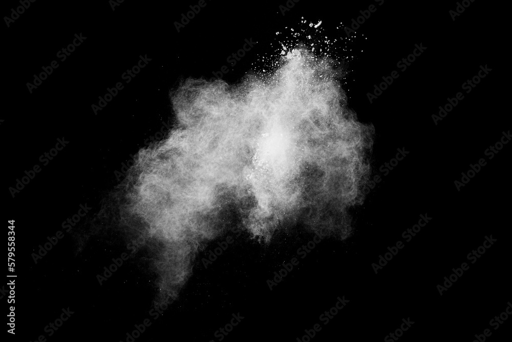 White powder explosion clouds.Freeze motion of white dust particle splash.