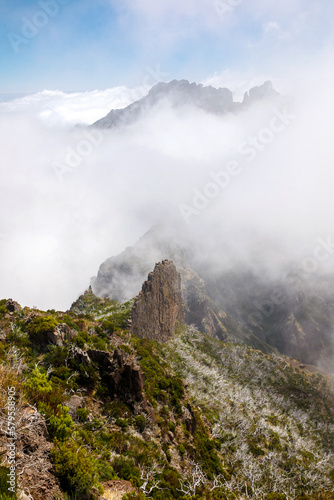 The mountain peaks in Madeira island in clouds, Fog around the rocks.