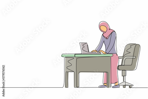 Single one line drawing woman employee working at ergonomic workstation. Office furniture with computer and laptop. Arab female standing on foot rest behind desk. Continuous line design graphic vector