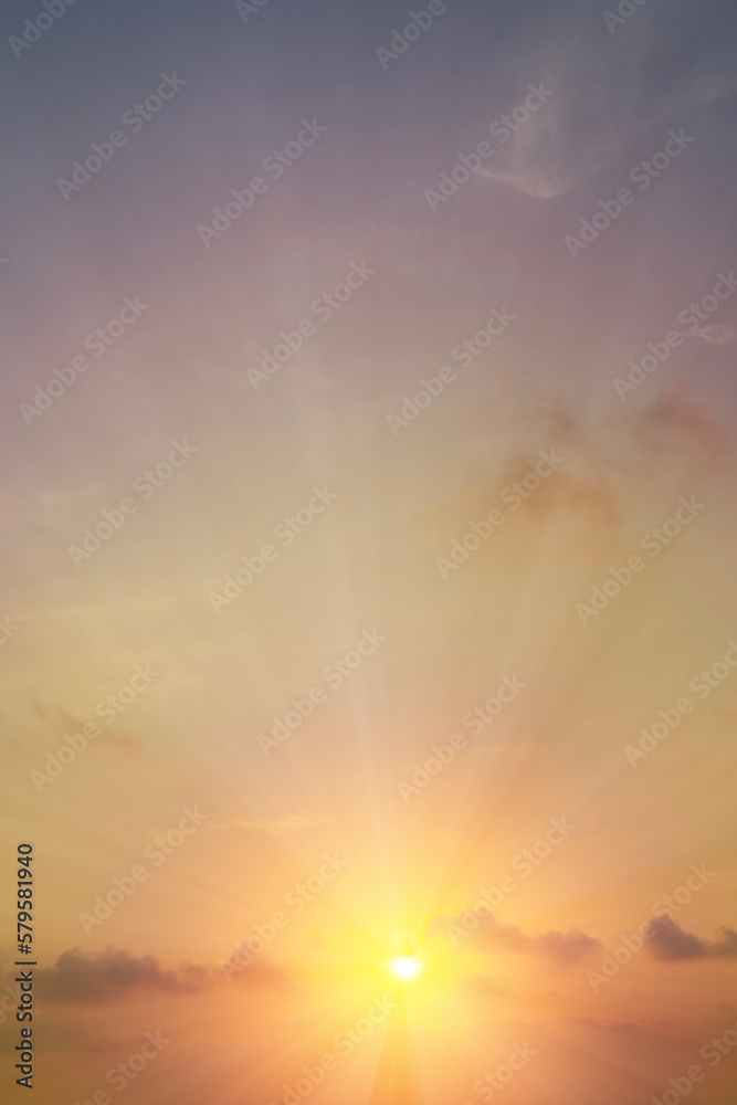 Dramatic morning sunrise with sky line in orange yellow and magenta mountains background.Vertical design for product or advertising