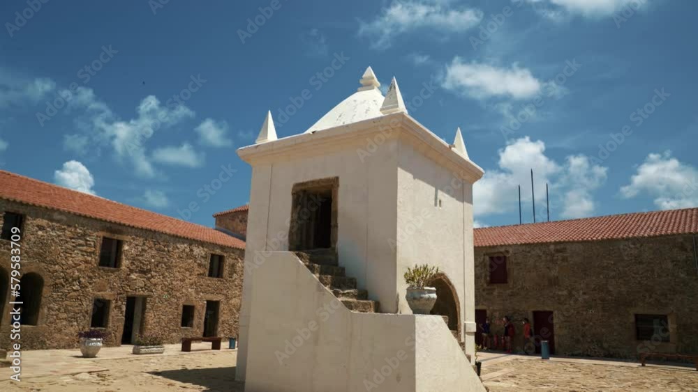Tilt up shot of a small chapel from the center of the famous tourist attraction, fort of the Three Wise Men, in the coastal capital city of Natal in Rio Grande do Norte, Brazil on a warm summer day. Tilt up shot of a small chapel from the center of the famous tourist attraction, fort of the Three Wise Men, in the coastal capital city of Natal in Rio Grande do Norte, Brazil on a warm summer day.