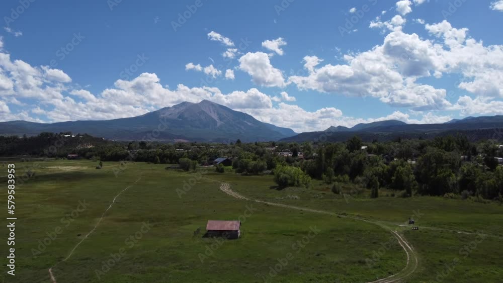 Rising drone shot of Mount Sopris and the town of Carbondale, Colorado. Rising drone shot of Mount Sopris and the town of Carbondale, Colorado.