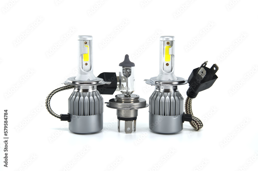 Car H4 LED and halogen headlight bulbs over white Car H4 LED and halogen headlight bulbs over white