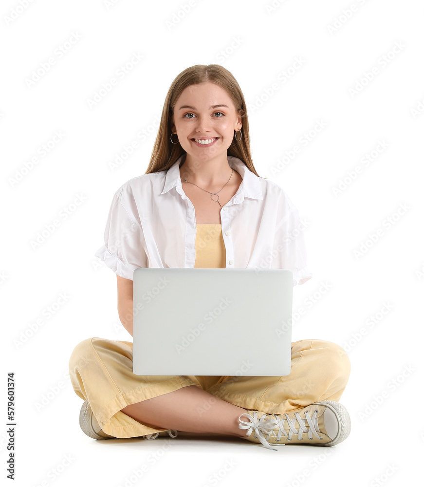 Beautiful girl with laptop sitting on white background Beautiful girl with laptop sitting on white background
