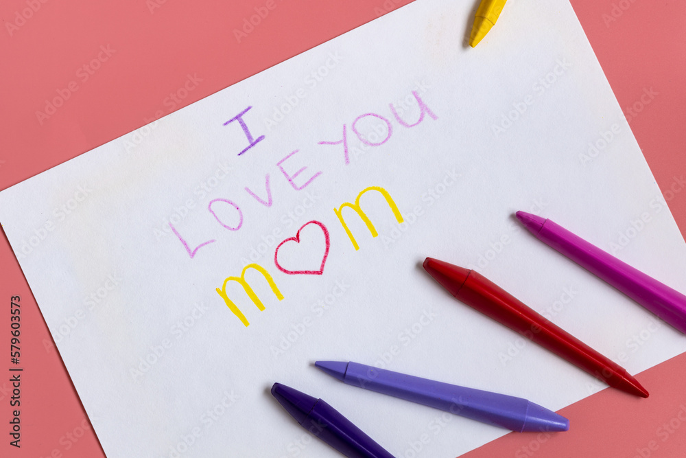 Greeting card for mummy on happy mothers day. Handwritting by kids with love congratulate for mom. Sign I love you mom Greeting card for mummy on happy mothers day. Handwritting by kids with love congratulate for mom. Sign I love you mom