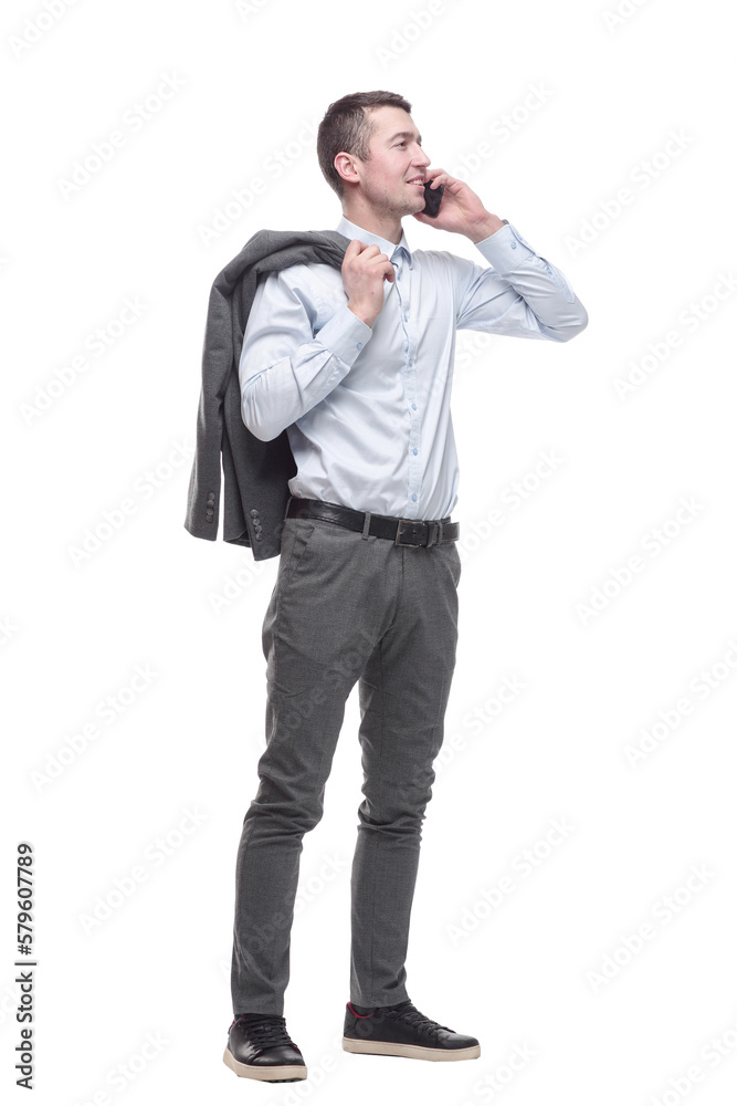 in full growth. smiling business man with a smartphone . in full growth. smiling business man with a smartphone .