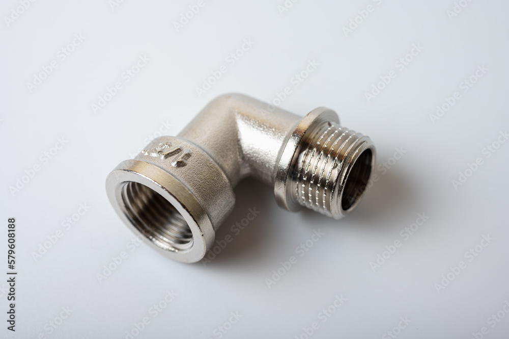 brass metal tee water adapters isolated on light background close up plumbing connections and details brass metal tee water adapters isolated on light background close up plumbing connections and details