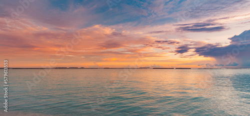 Panoramic sea skyline beach. Amazing sunrise beach landscape. Panorama of tropical beach seascape horizon. Abstract colorful sunset sky light tranquil relax summer seascape freedom wide angle seascape