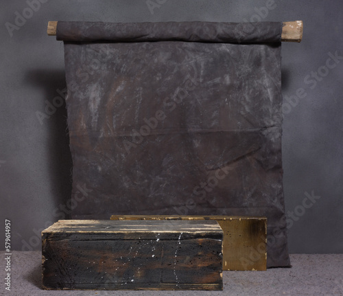 old rough cloth wall on a wooden table for product placement, cloth wall, wooden floor old texture cloth rough raw look, antique piece of cloth. aged texture