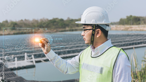 Engineer or Technician man pointing finger or Hand with an icon of energy in front show symbols of various energies with a solar cell in the background, Concepts of clean energy source for renewable. 