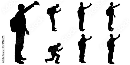 A guy looking at the phone screen, and shooting a video. Teen talking with a friend using video call, taking pictures for memories. Boy taking photos by cell phone. Black silhouette isolated on white