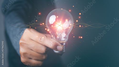 Man holding light bulbs the new ideas with innovation technology and creative.