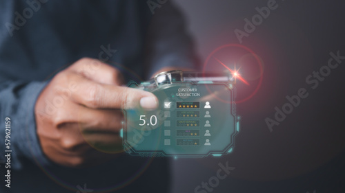 Man using phone giving high score with five star icon and excellent satisfaction service.