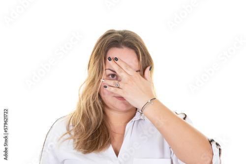 woman her gaze behind the hand young chubby hiding behind finger palm portrait on white background