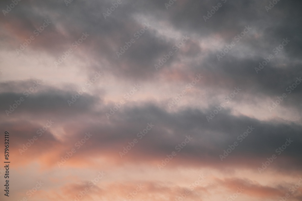 Sunset sky. The sunrise is decorated with clouds in various shapes