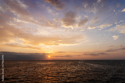 Colorful sunset over ocean © karandaev