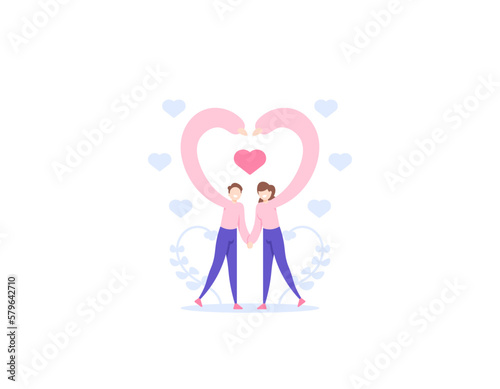 a couple that is celebrating an anniversary. a boyfriend and a girlfriend doing a pose together and making a love symbol by combining their hands. celebrate valentine's day. happy valentines. romantic